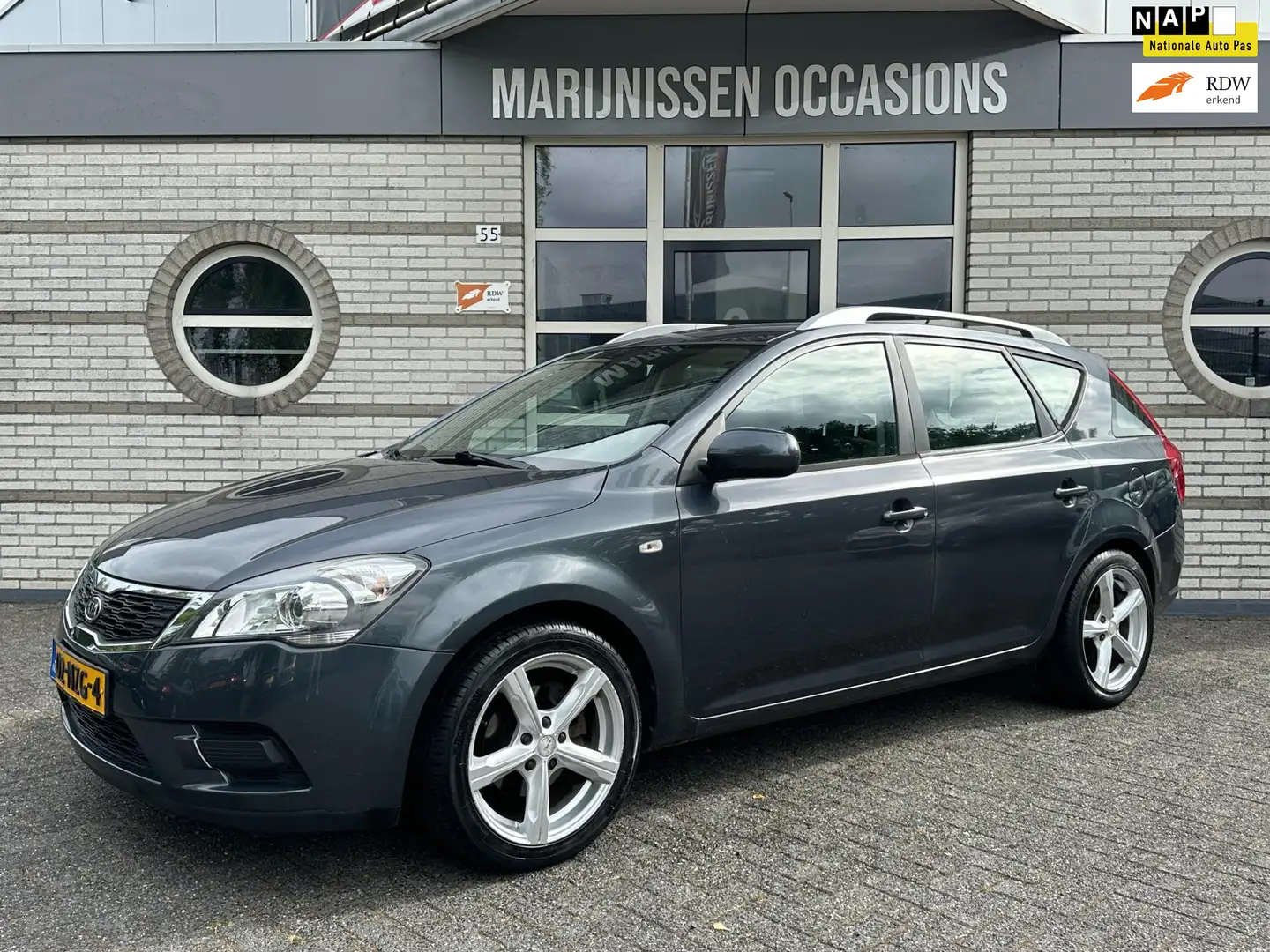 Kia Ceed / cee'd 1.4 CVVT X-tra |Airco,Cruise,ElekPakket| Gris - 1