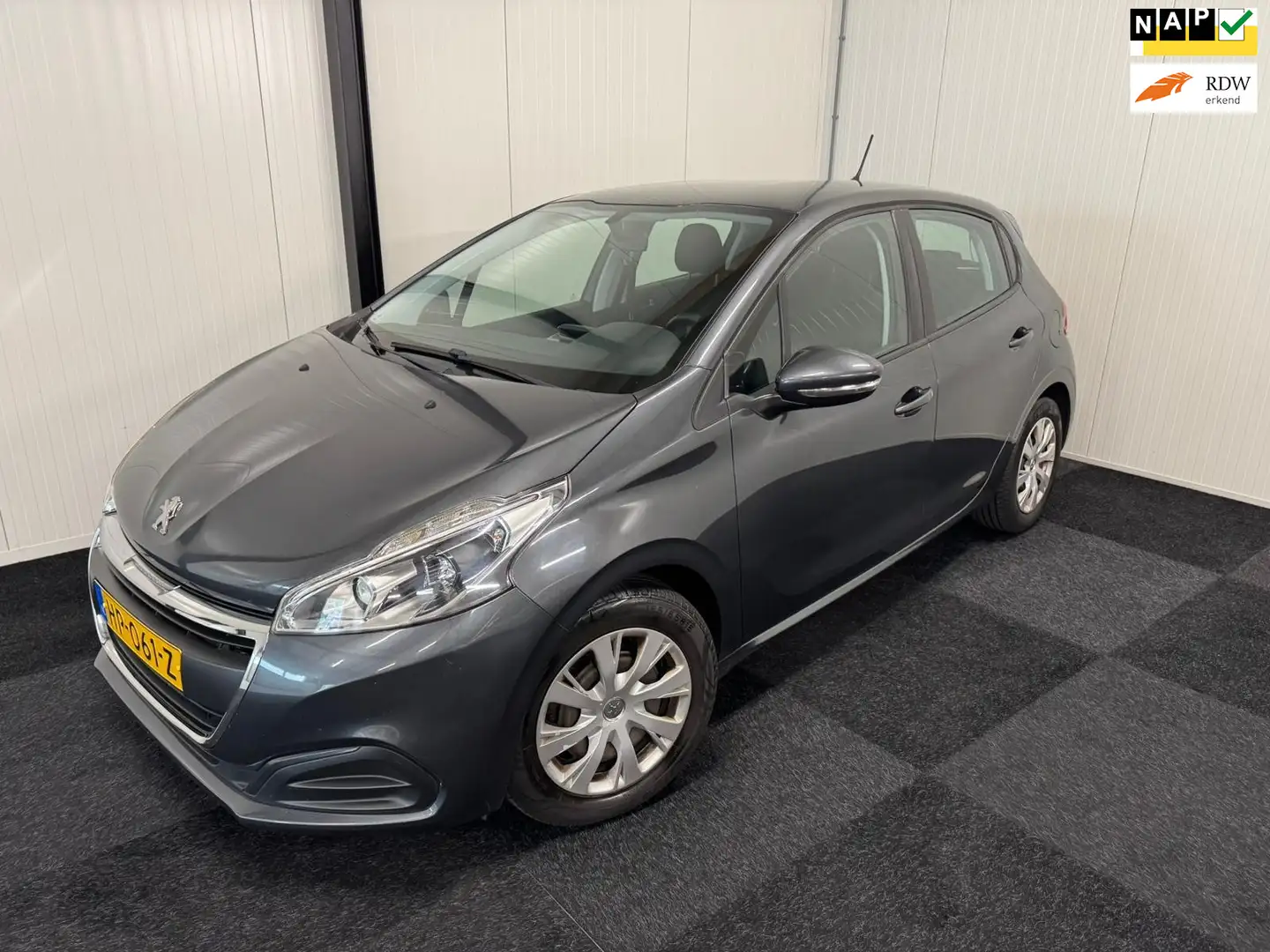 Peugeot 208 1.6 BlueHDi 2015 100PK EURO6 AIRCO/NAVI/CRUISE/APK Grijs - 1