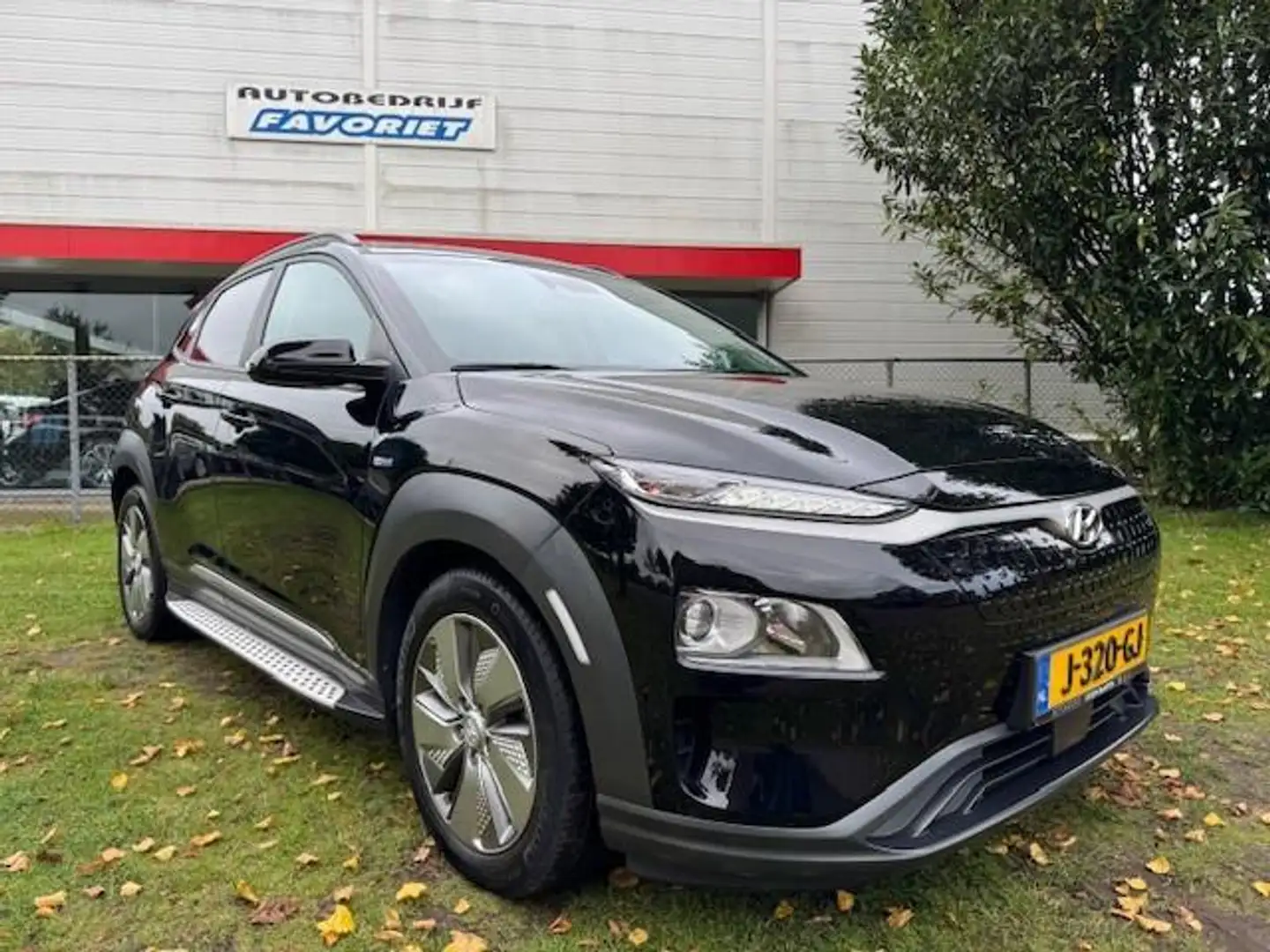Hyundai KONA EV FASHION 64KWH 3FASE/HUP/ACARPLAY/SIDESKIRTS/FAB Black - 1