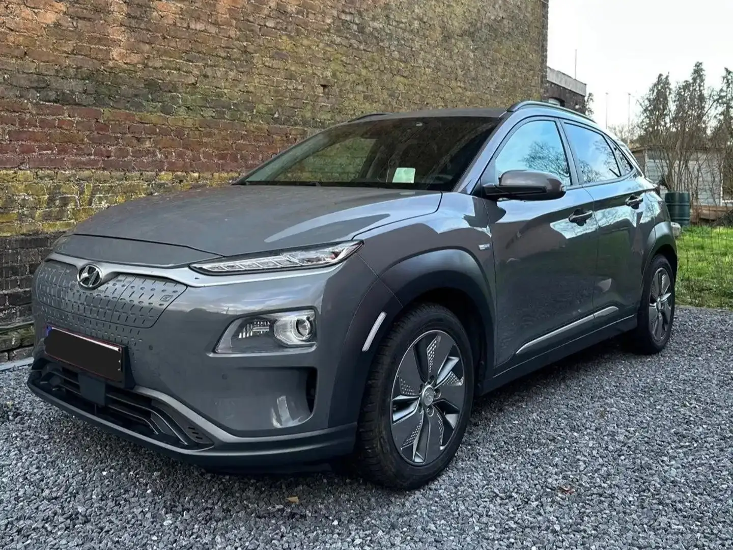 Hyundai KONA e-Kona 64 kWh Sky (SoH 91,7%) Grijs - 1