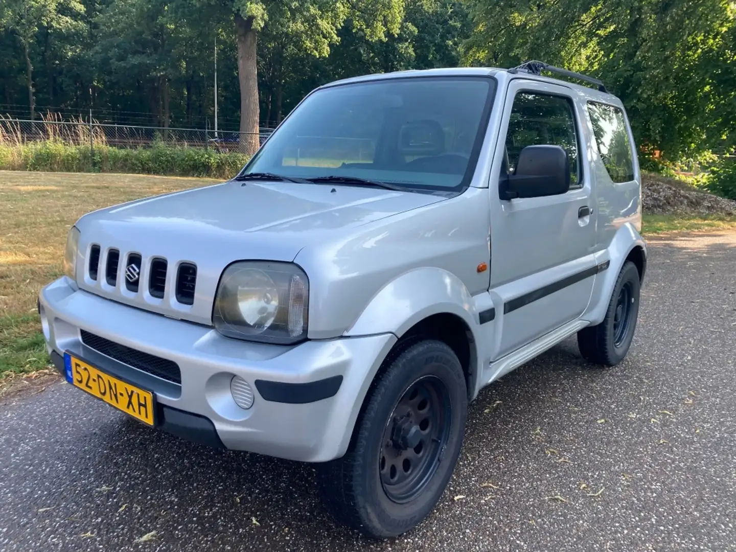 Suzuki Jimny 1.3 JLX Grijs - 1