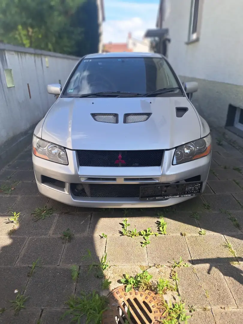 Mitsubishi Lancer Evolution 7 Серебристый - 1