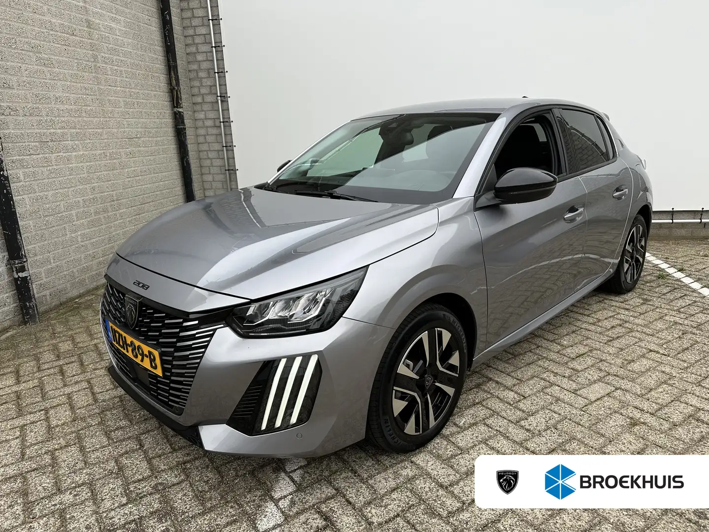 Peugeot 208 Hybrid 100 e-DCS6 Allure | Achterbank in delen nee Gris - 1