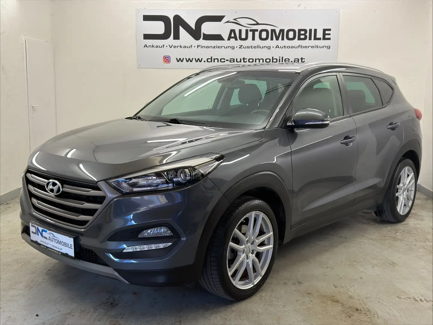 Hyundai TUCSON 1,7 CRDI Aut. Start-Stopp Go DCT*NAVI*SHZ* Grau - 1