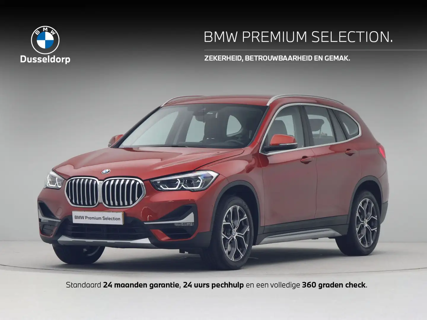 BMW X1 xDrive20i Business Edition Plus Oranje - 1