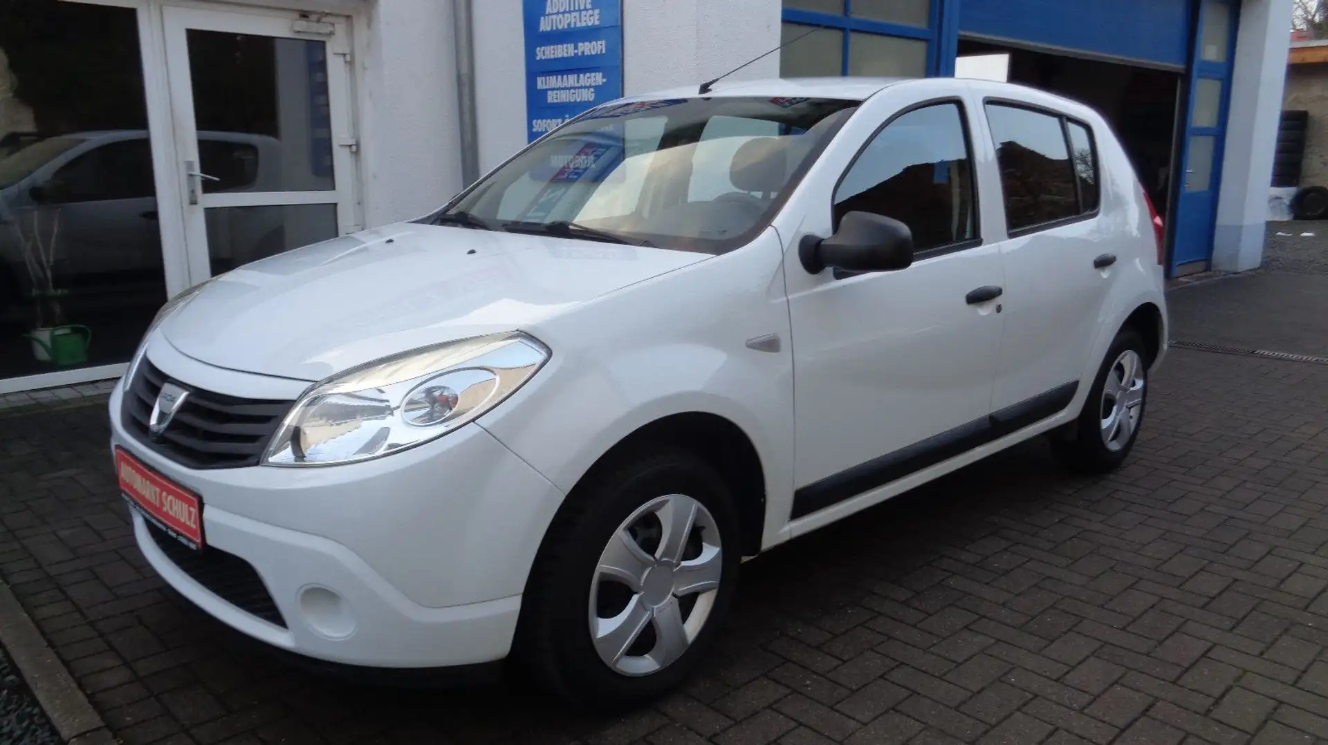 Dacia Sandero 1.2 16V Ambiance Wenig Km, WR, SH Alb - 1