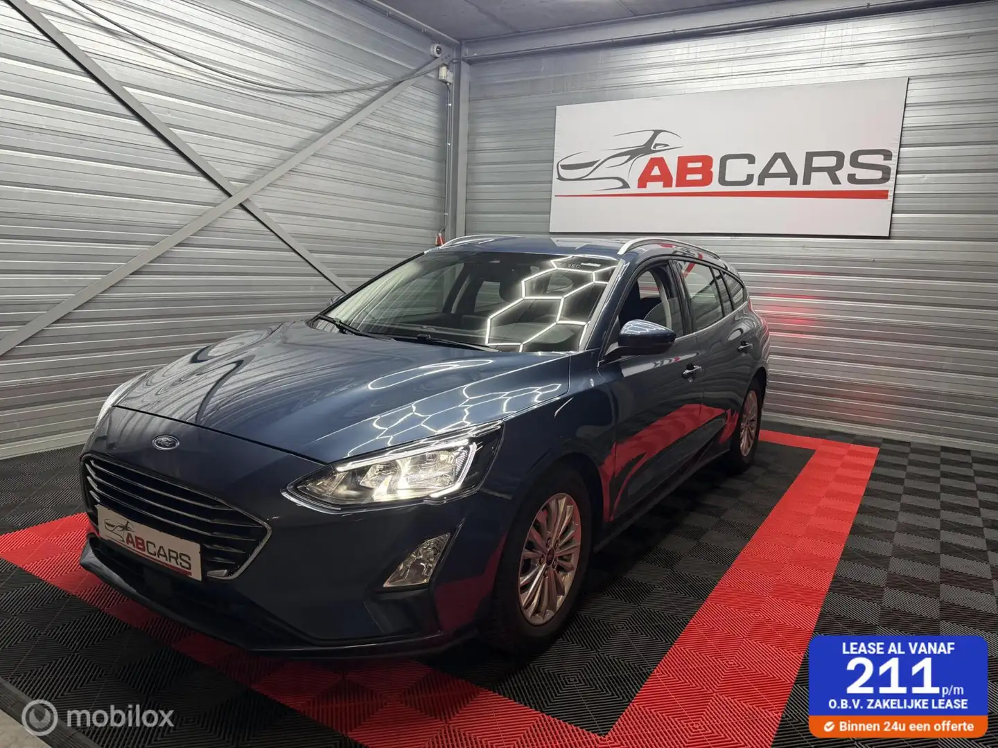 Ford Focus Wagon 1.0 EcoBoost Hybrid Titanium X Business Blauw - 1