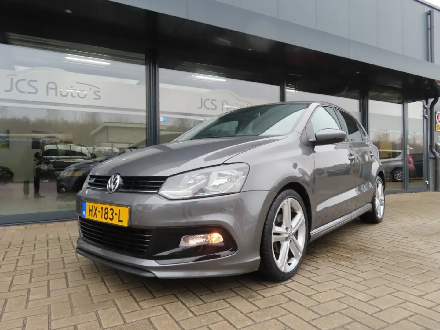 Volkswagen Polo 1.2 TSI Edition R Ecc Navi Pdc 17 Inch 2016 Grau - 1
