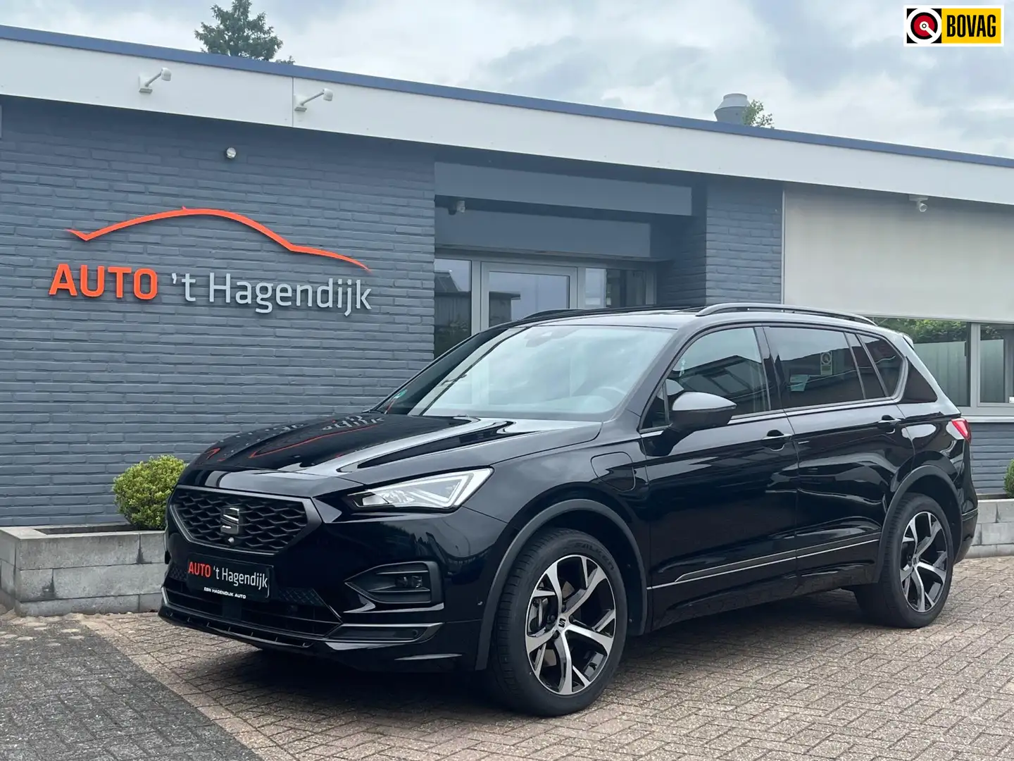 SEAT Tarraco 1.4 TSI e-Hybrid PHEV FR 245PK pano 1EIG 19" Zwart - 1