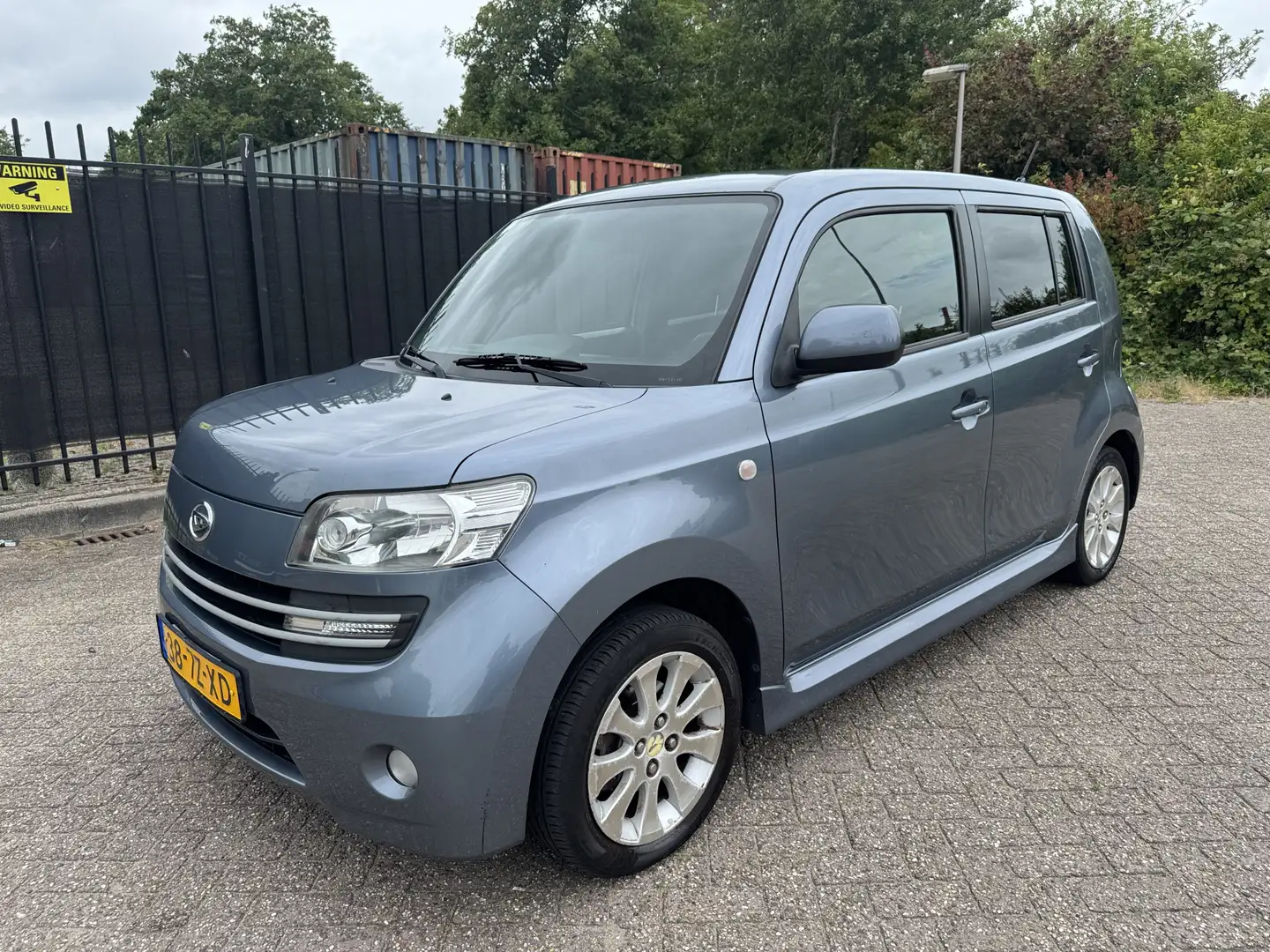 Daihatsu Materia 1.3 Funk 5 Drs StrBkr AC/LMV Grijs - 1