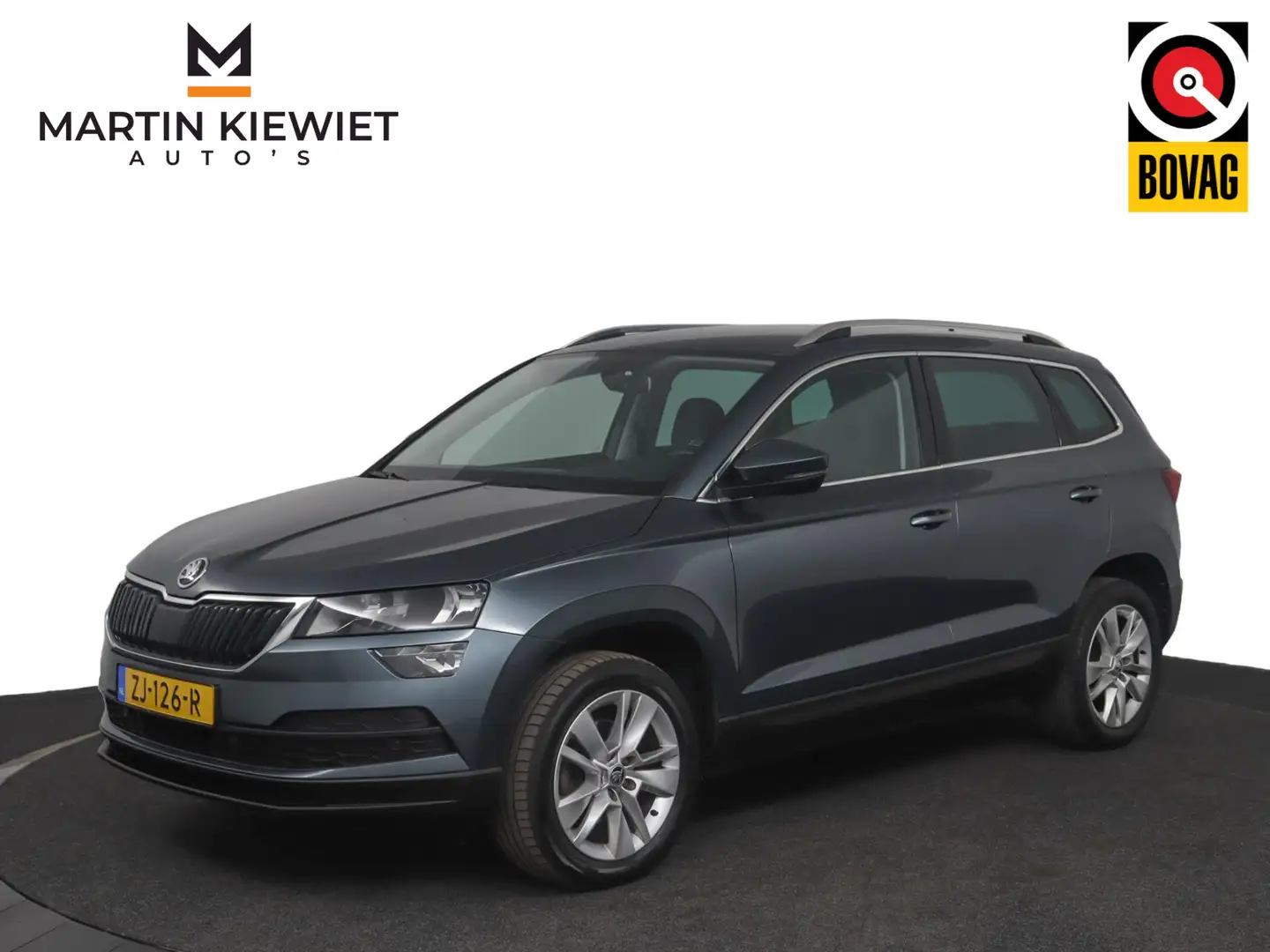 Skoda Karoq 1.0 TSI Ambition Business|Stoelverwarming|Half led Grijs - 1