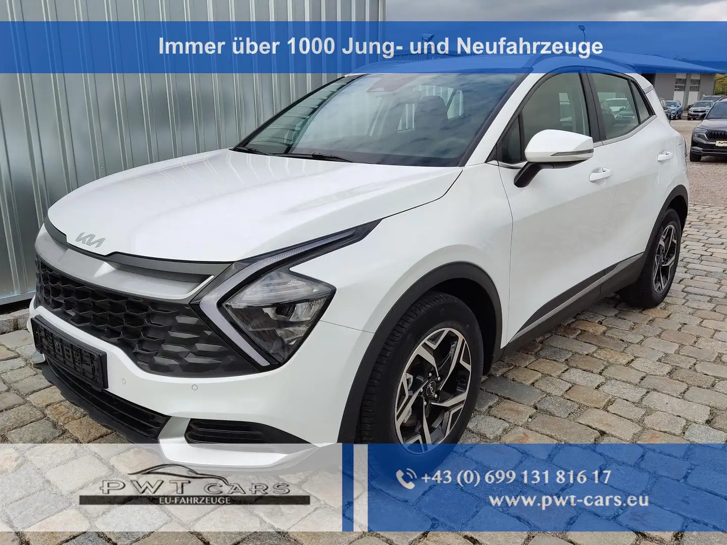 Kia Sportage Urban 1.6 T-GDI MHEV 160 PS -Navi 12,3 Zoll-Rüc... Wit - 1
