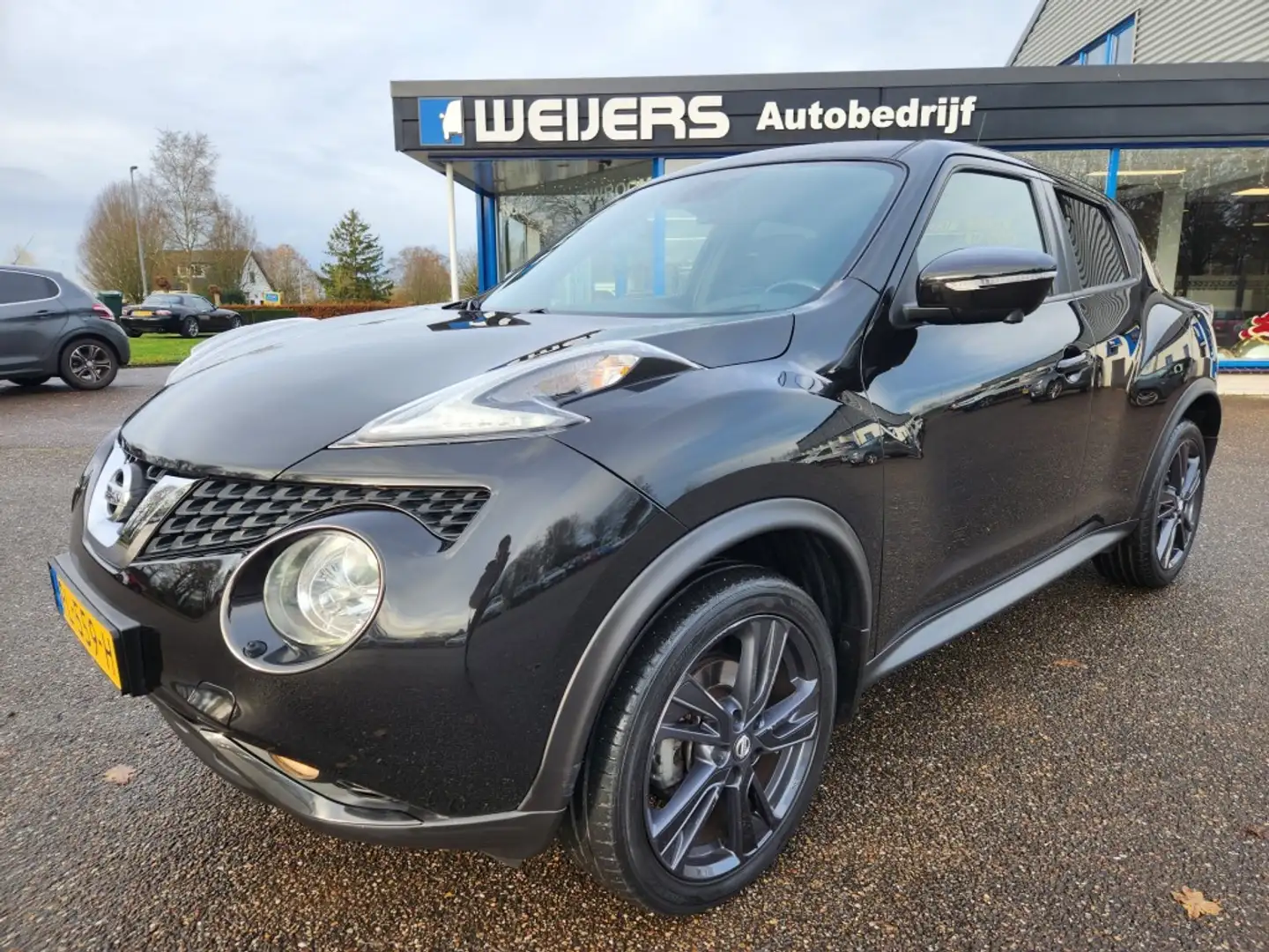 Nissan Juke 1.2 DIG-T S/S TEKNA Leer, Navi, Electr.panoramadak Zwart - 1