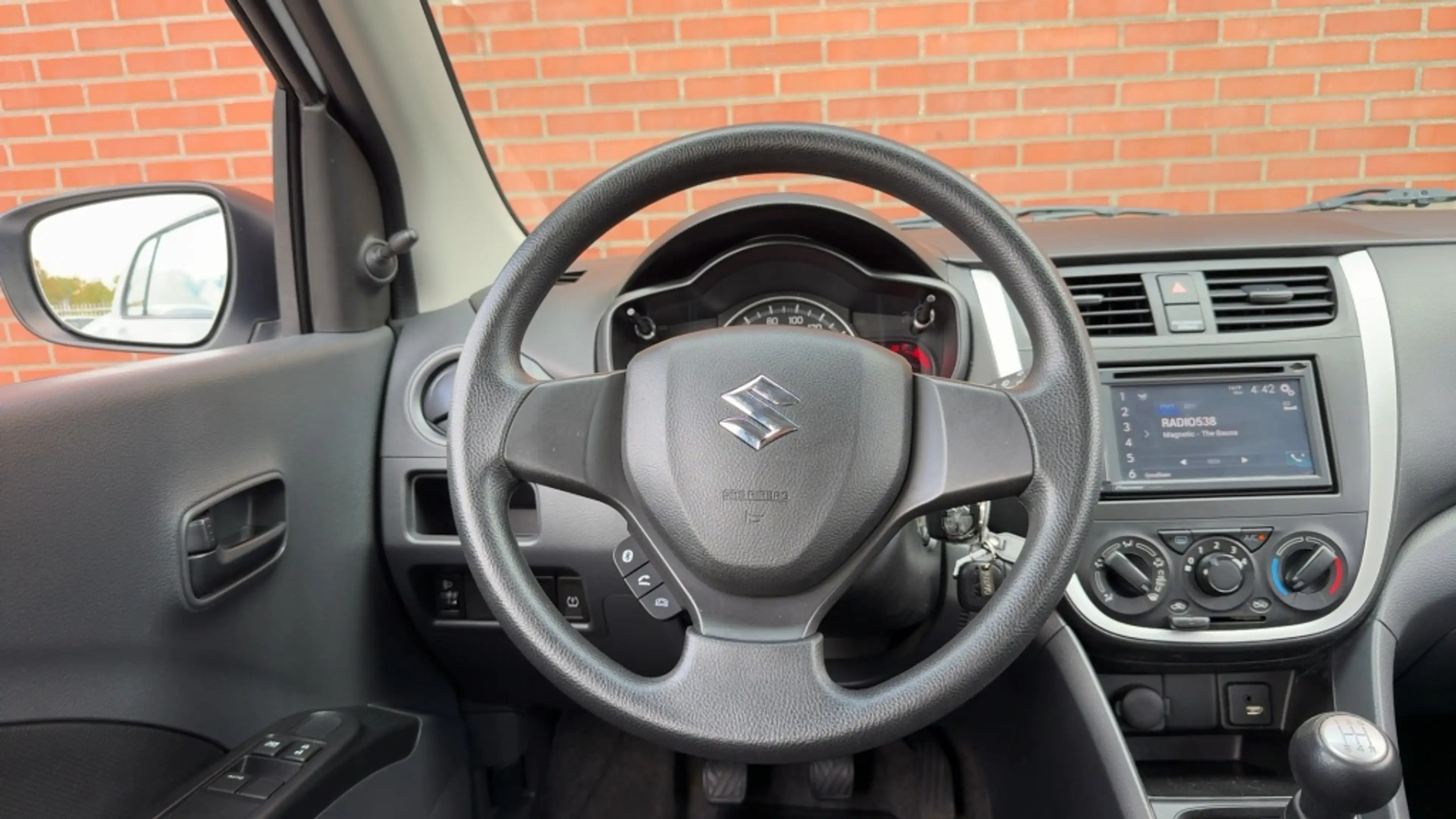 Suzuki Celerio 1.0 Comfort Audio Airco 12 maanden BOVAG Garantie — photo 11