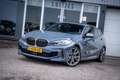 BMW 135 1-serie M135i xDrive High Executive I Pano-dak I H Grijs - thumbnail 18