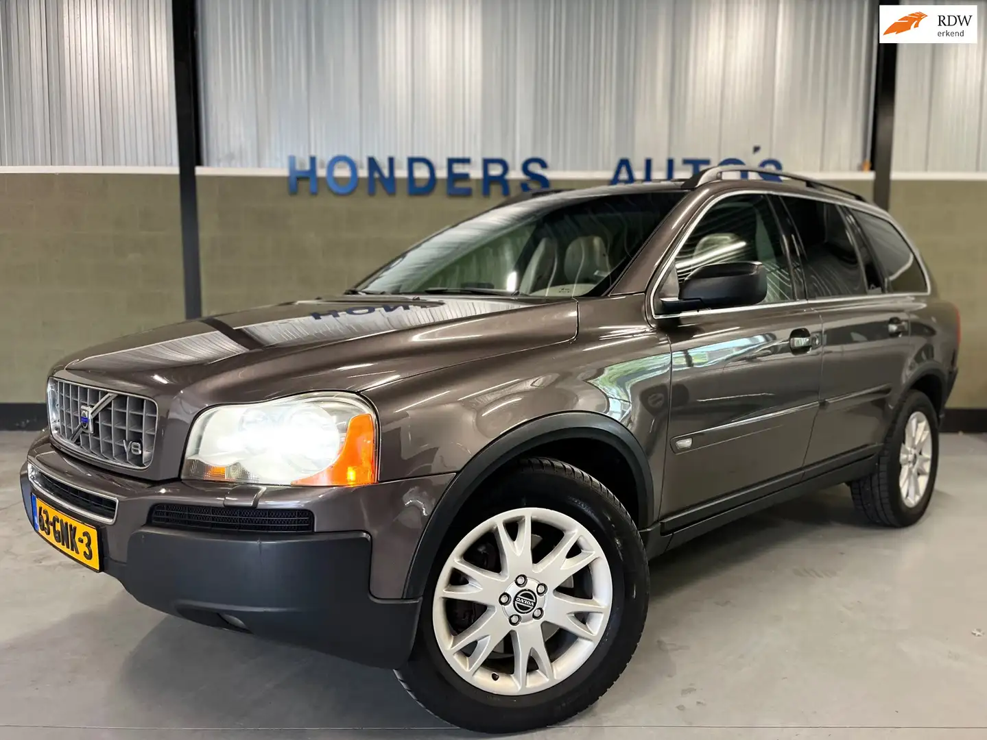Volvo XC90 4.4 V8 Summum 7-PERS AUT I TREKHAAK I SCHUIFDAK I Gris - 1