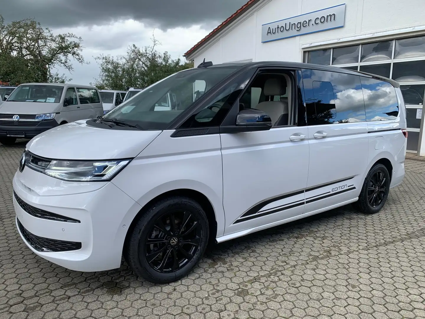 Volkswagen T7 Multivan Edition 4Motion eHybrid Lang LÜ ArtVelours AHK Eas Blanc - 1