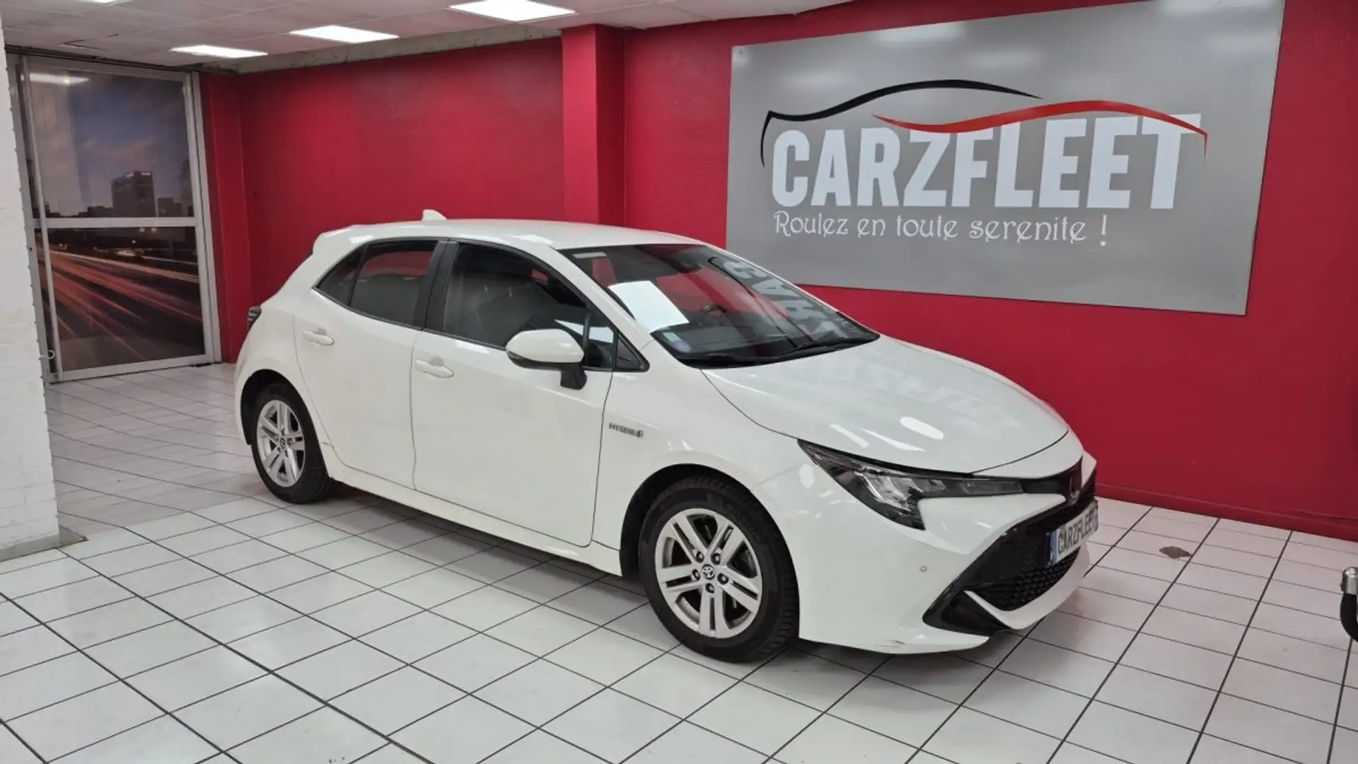 Toyota Corolla BERLINE HYBRIDE 184cv DYNAMIC BUSINESS/1 ERE MAIN/TVA RECUP Blanc - 1