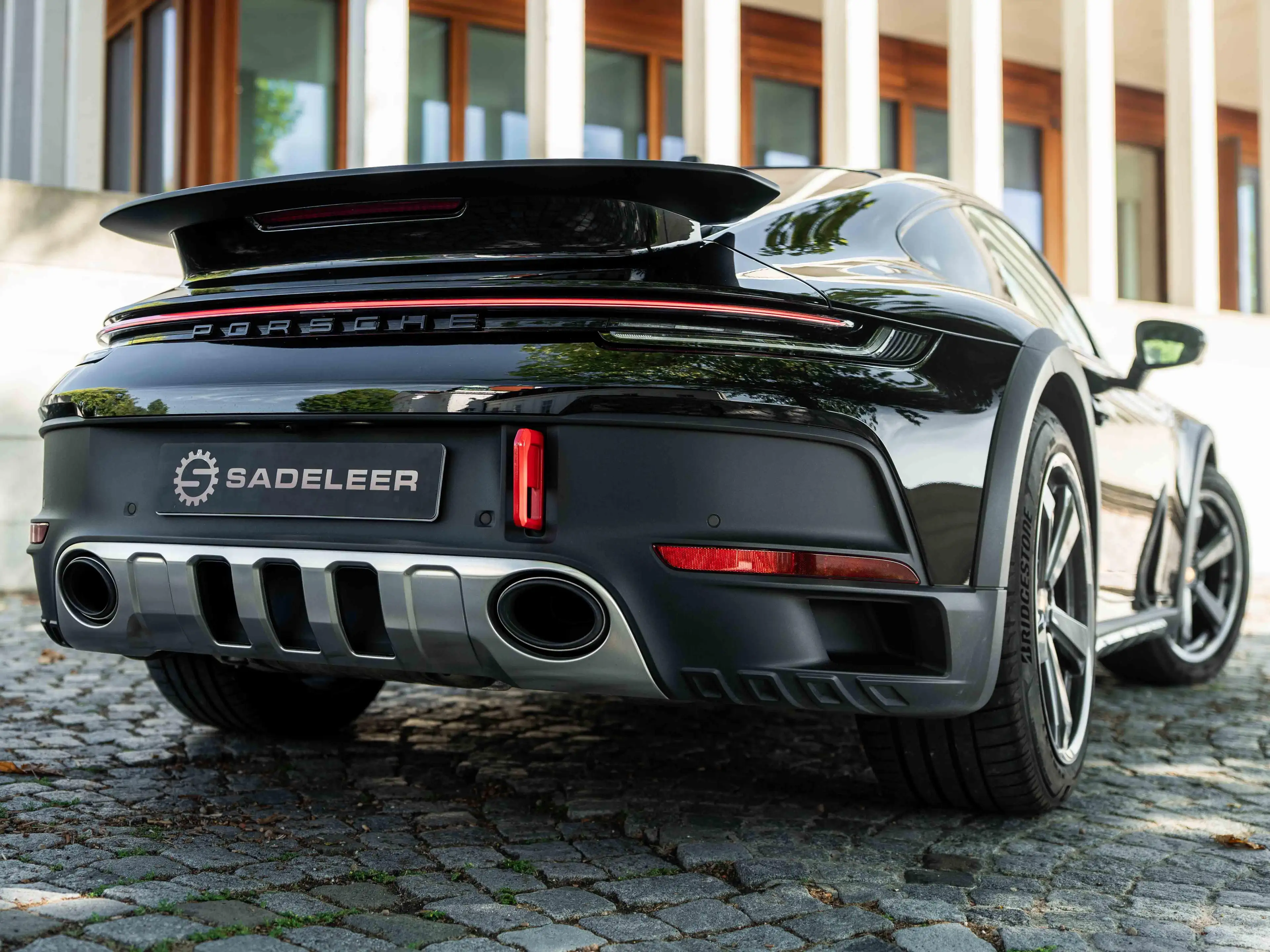 Porsche 992 Dakar - Carbon Roof, Buckets, Tartan Inserts — photo 5