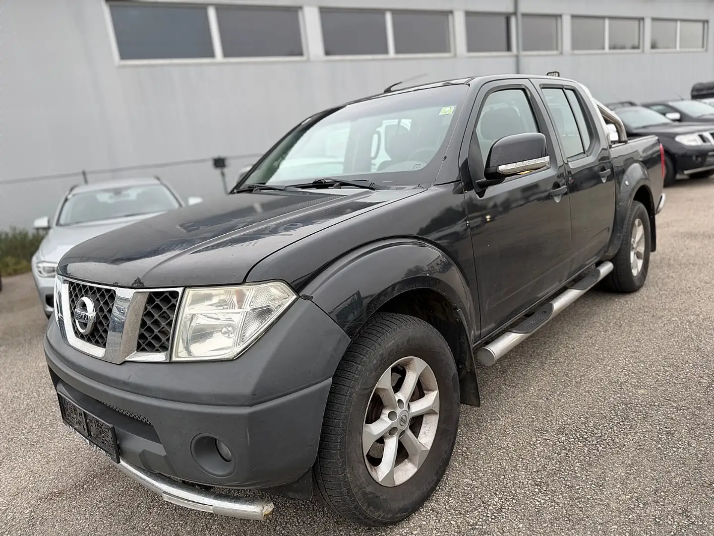 Nissan Navara Navara Double Cab 2,5  4x4 Schwarz - 1