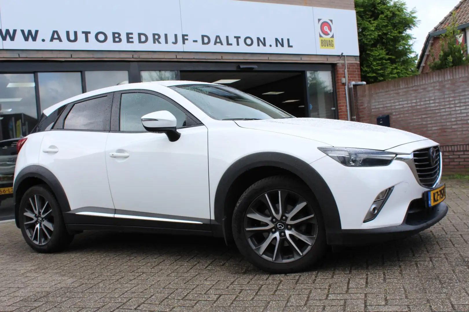 Mazda CX-3 2.0 SkyActiv-G 120 GT-M METALLIC / LEER / NAVIGATI Wit - 2