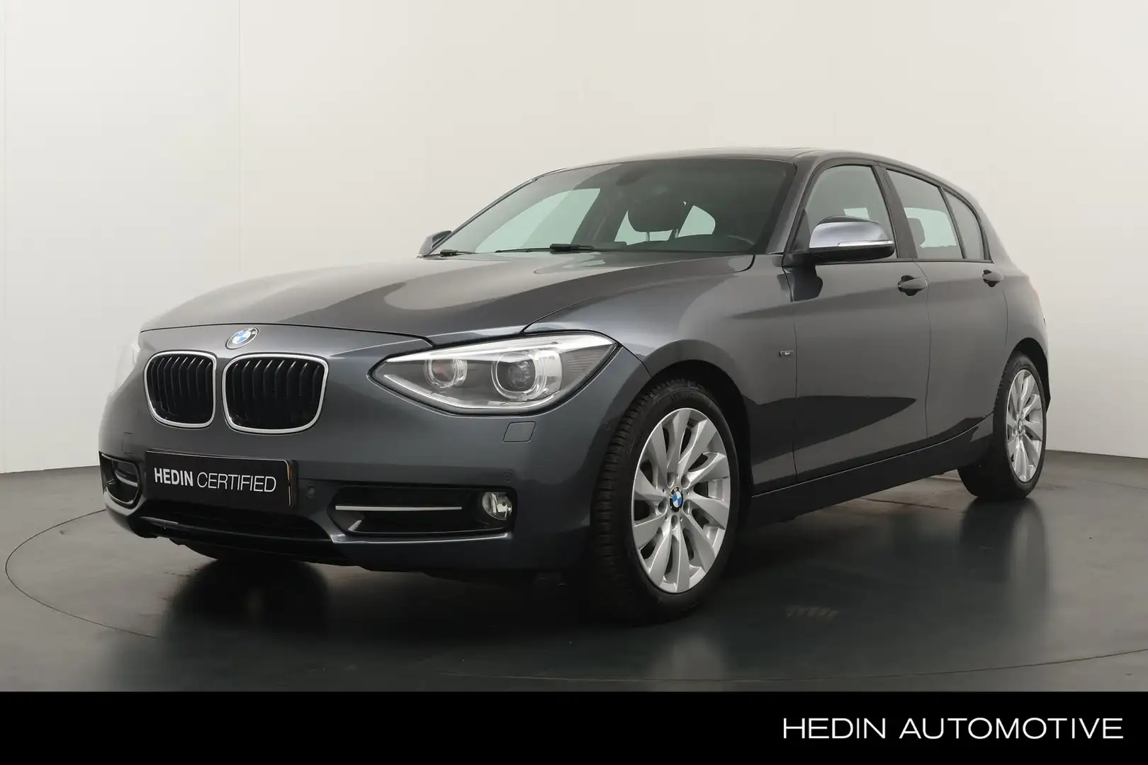 BMW 116 1-serie 116i Business+ Automaat | Trekhaak | Navig Grijs - 1