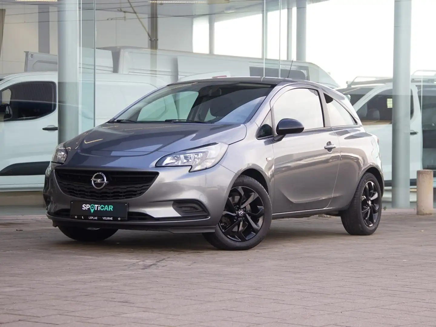 Opel Corsa BLACK EDITION 1.4 TURBO 100PK *GPS*SENSOREN* Grijs - 1
