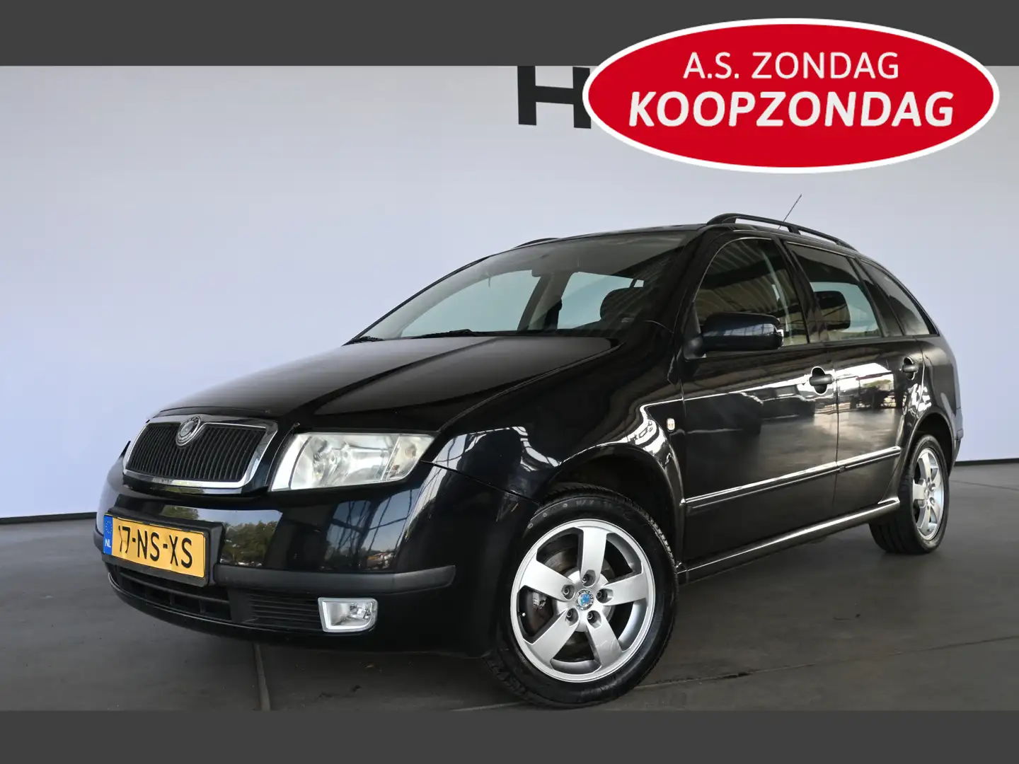 Skoda Fabia Combi 1.4-16V Choice Airco Cruise control PDC Elek Zwart - 1