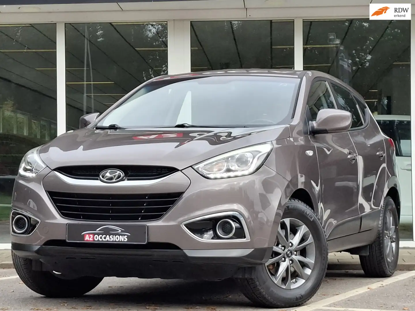 Hyundai iX35 1.6i GDI Cruise/Bluetooth/PDC/Stoelverwarming Bruin - 1