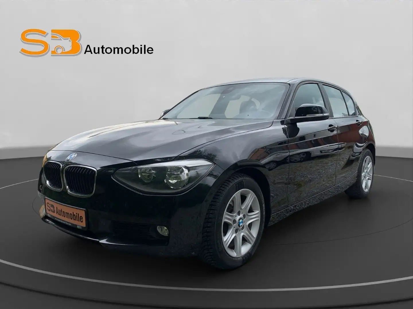 BMW 118 1 Lim. 5-trg. 118 i*TÜV 01/27*Navi*PDC*SHZ* Zwart - 1