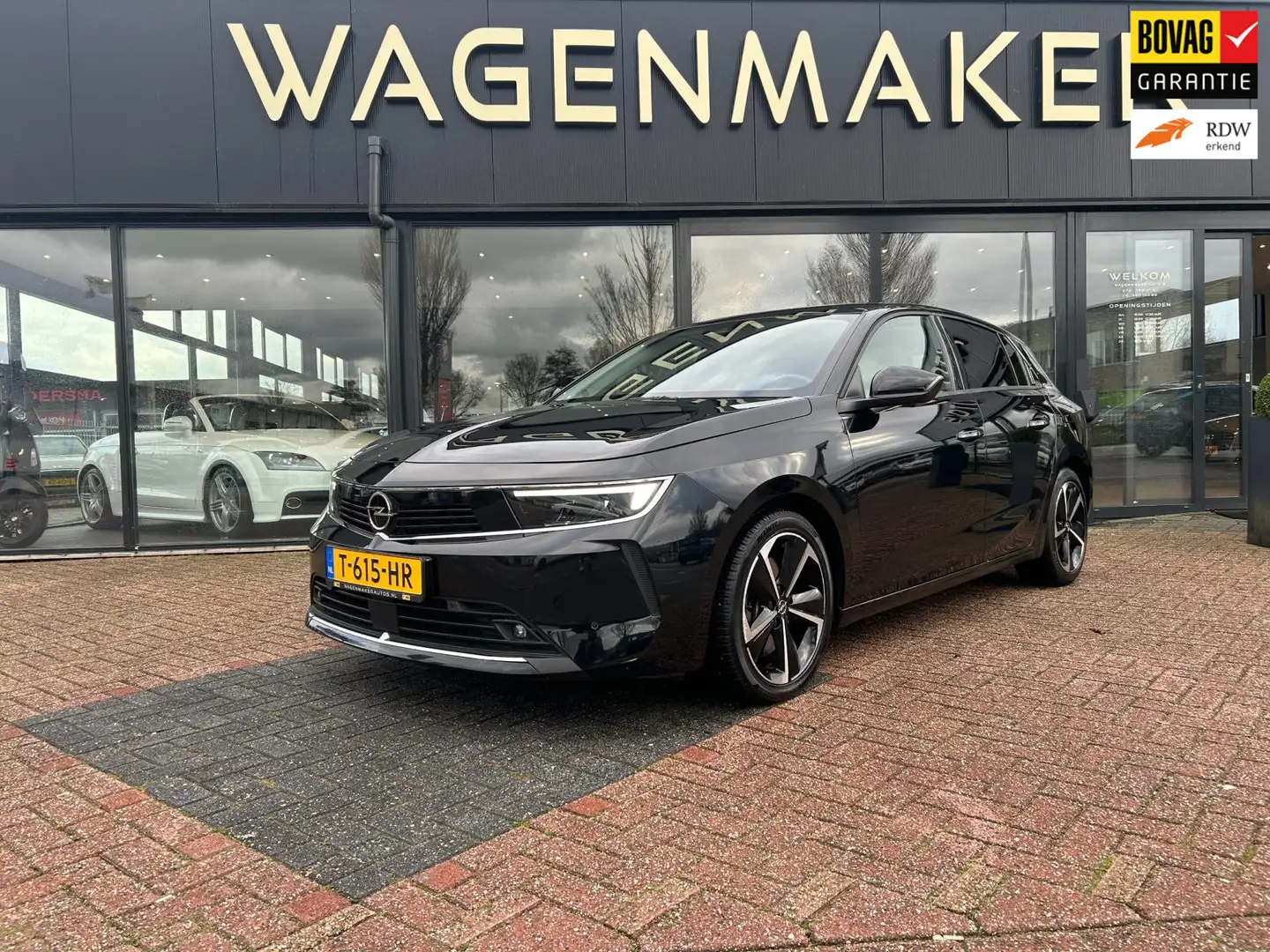 Opel Astra 1.6 Hybrid Elegance AUT|NAVI|ACC|CAM|Stoelvw! Zwart - 1
