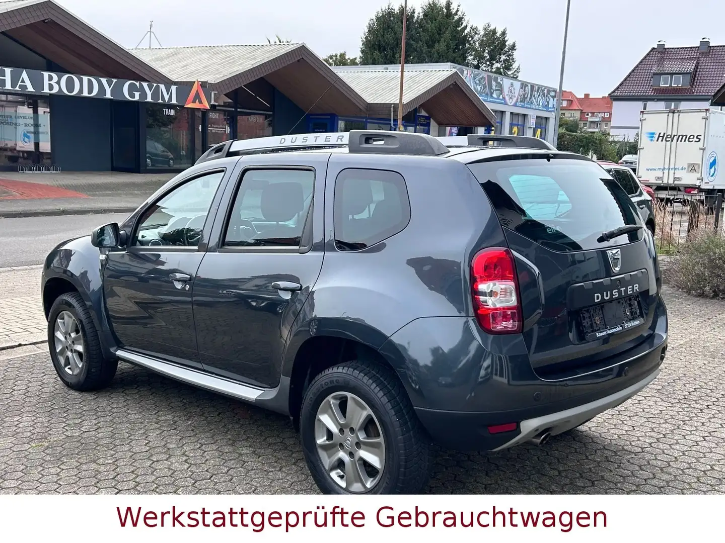 Dacia Duster I Laureate 4x2 *Klima* Sitzheiz*Navi*PDC* Gris - 2