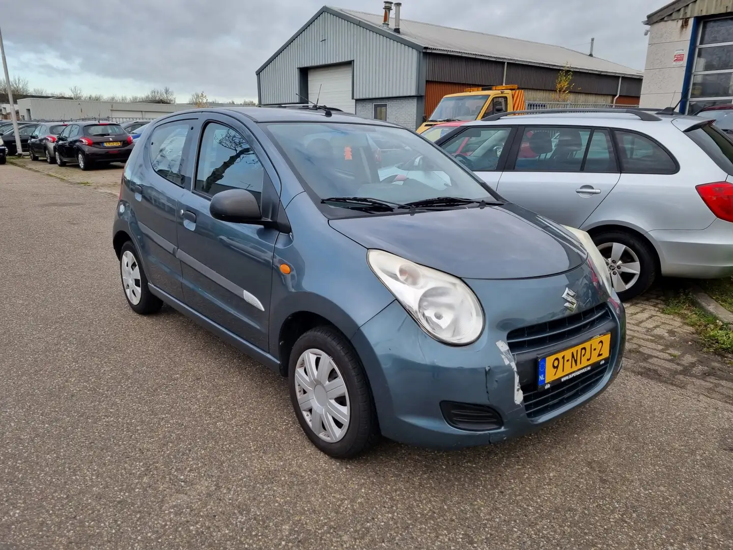 Suzuki Alto 1.0 Spirit Bj:2010 NAP! Grijs - 2