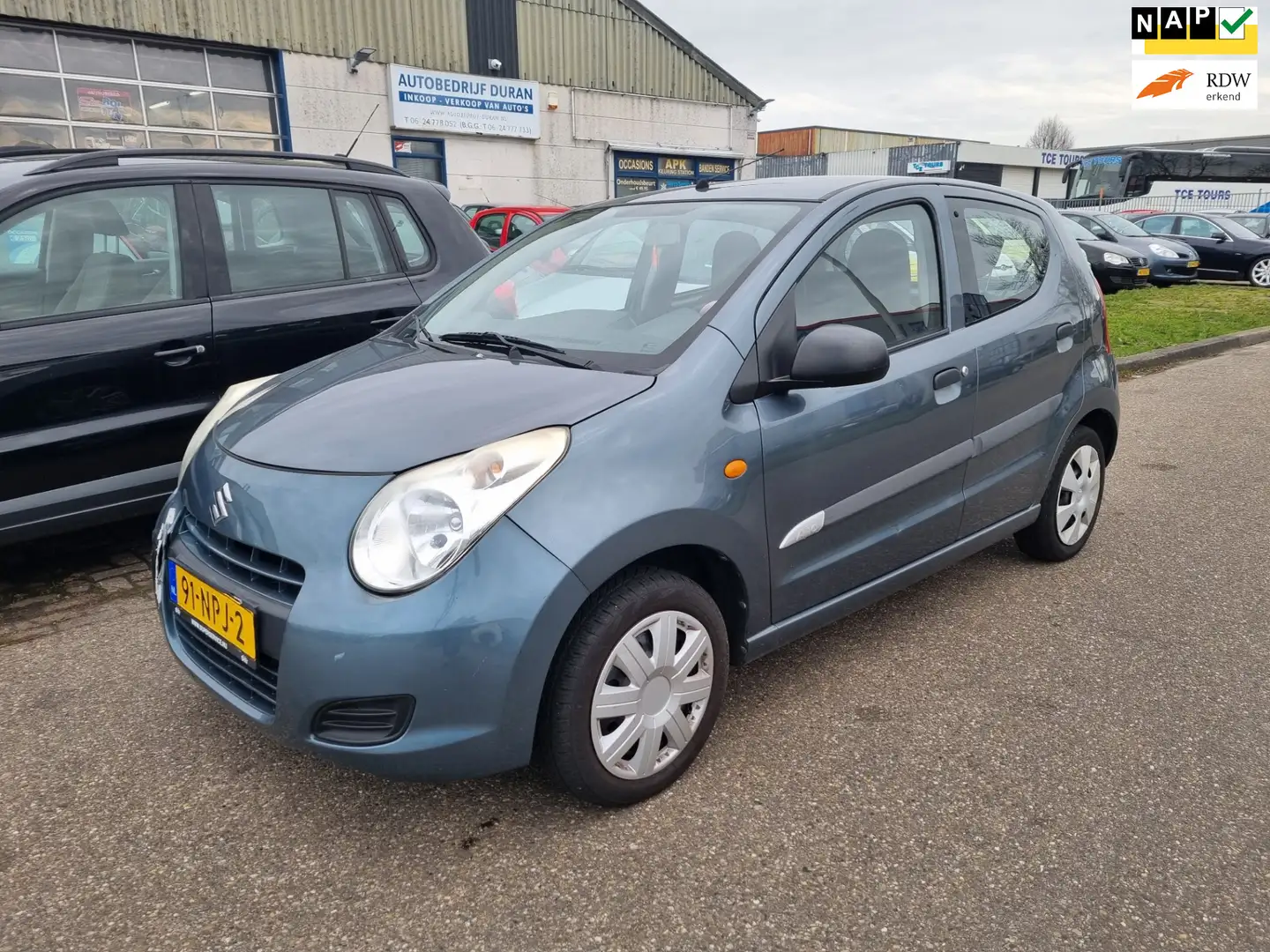 Suzuki Alto 1.0 Spirit Bj:2010 NAP! Grijs - 1