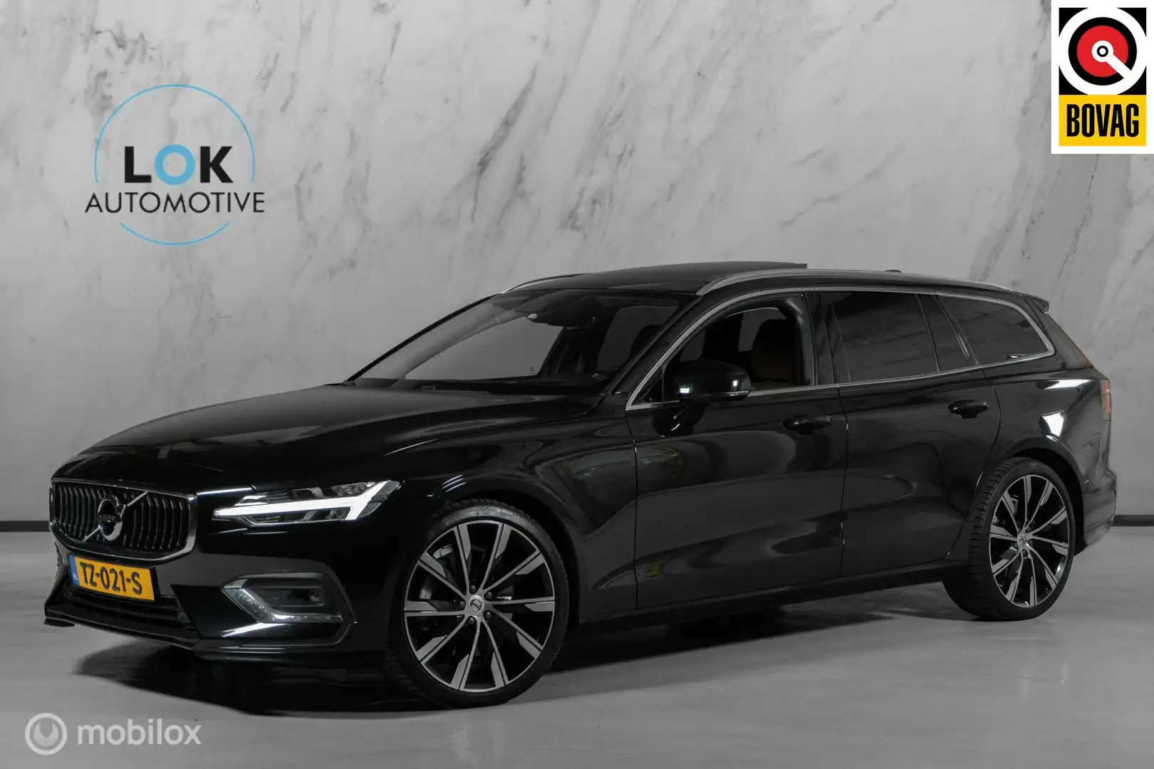 Volvo V60 2.0 T5 R-Design|PANO|H&K|HUD|LEDER|KEYLESS|ACC| Zwart - 1