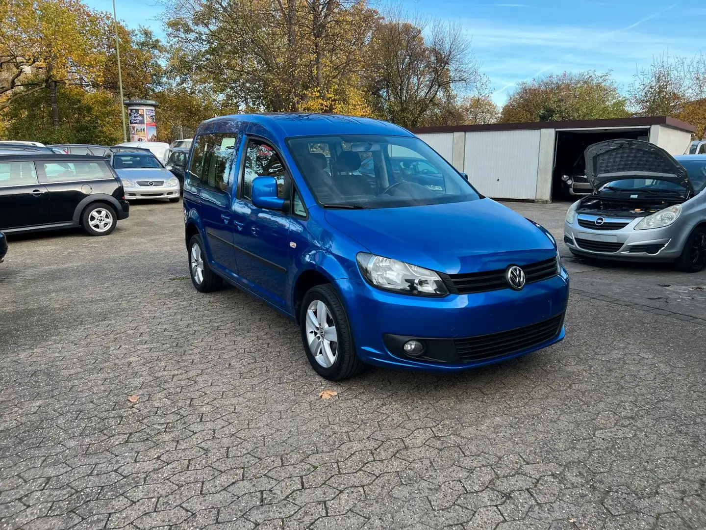 Volkswagen Caddy 1.2 TSI Maxi-Roncalli Klima-1.Hand-7 Sitze Blau - 1