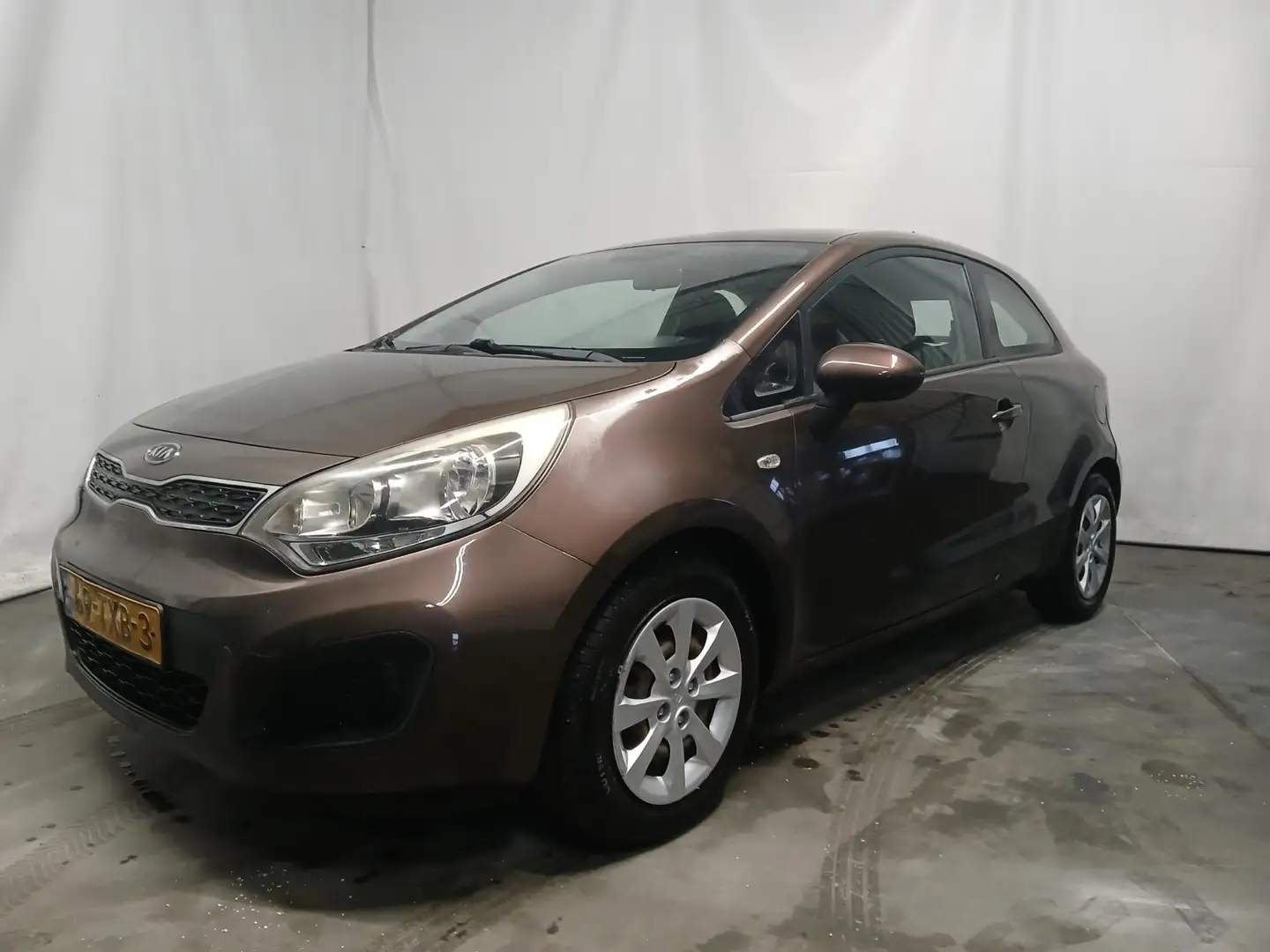 Kia Rio 1.1 CRDi Comfort Pack - Schade Bruin - 2