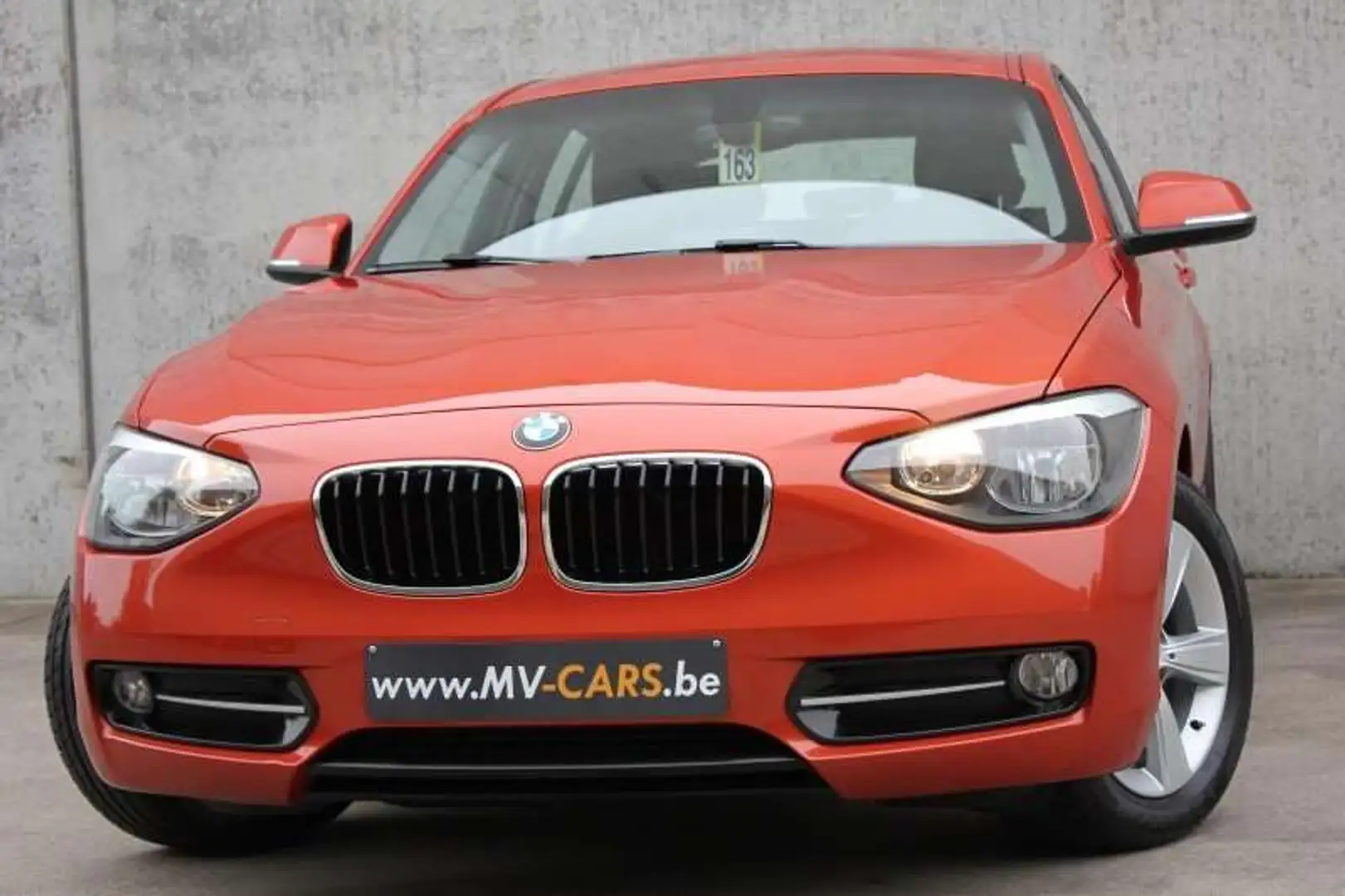 BMW 116 BMW 116i/5-deur/sport/pdc/navi/multistuur... Orange - 1