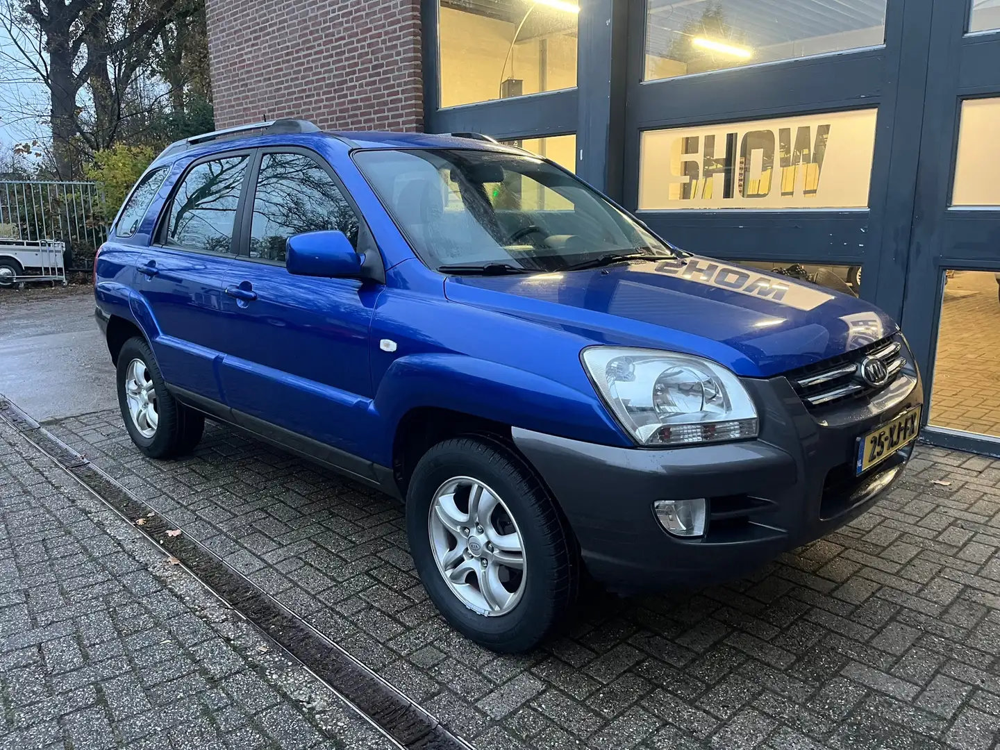 Kia Sportage 2.0 CVVT Comfort, 2e eigenaar Blauw - 2