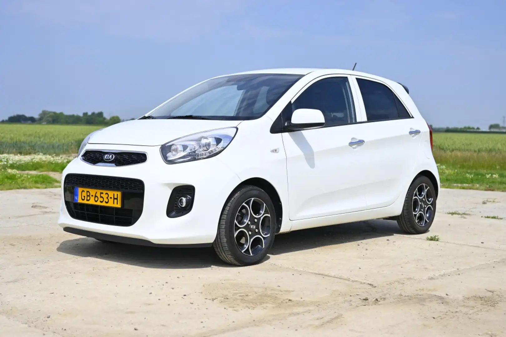 Kia Picanto 1.2 CVVT First Ed. Navigatie Weiß - 1