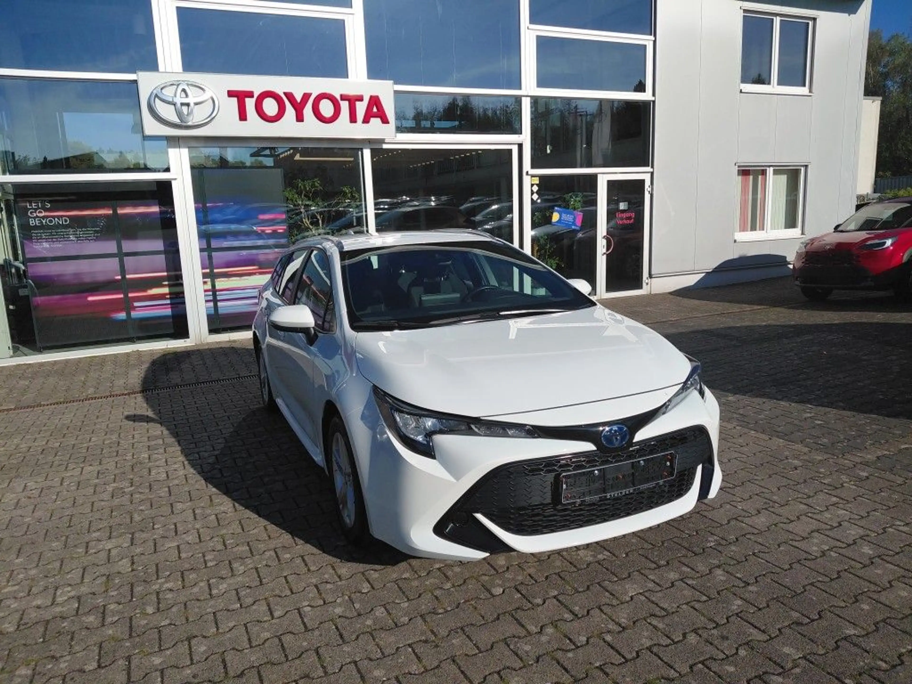 Toyota Corolla 1.8 Hybrid Touring Sports Comfort — photo 7