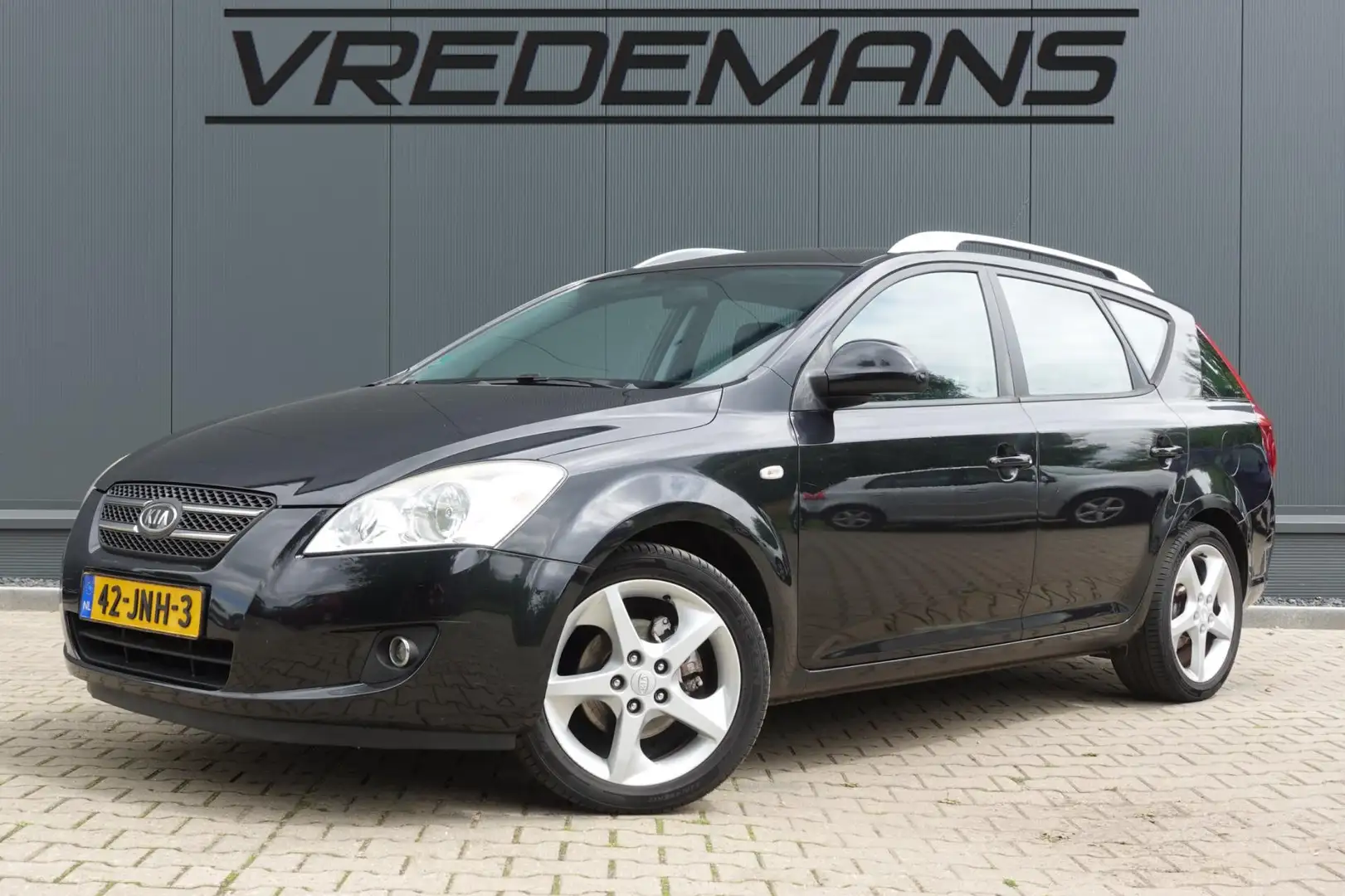 Kia Ceed / cee'd Sporty Wagon 1.4 X-ecutive ISG Zwart - 1