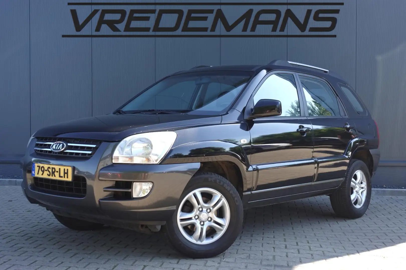 Kia Sportage 2.0 CVVT Executive Zwart - 1