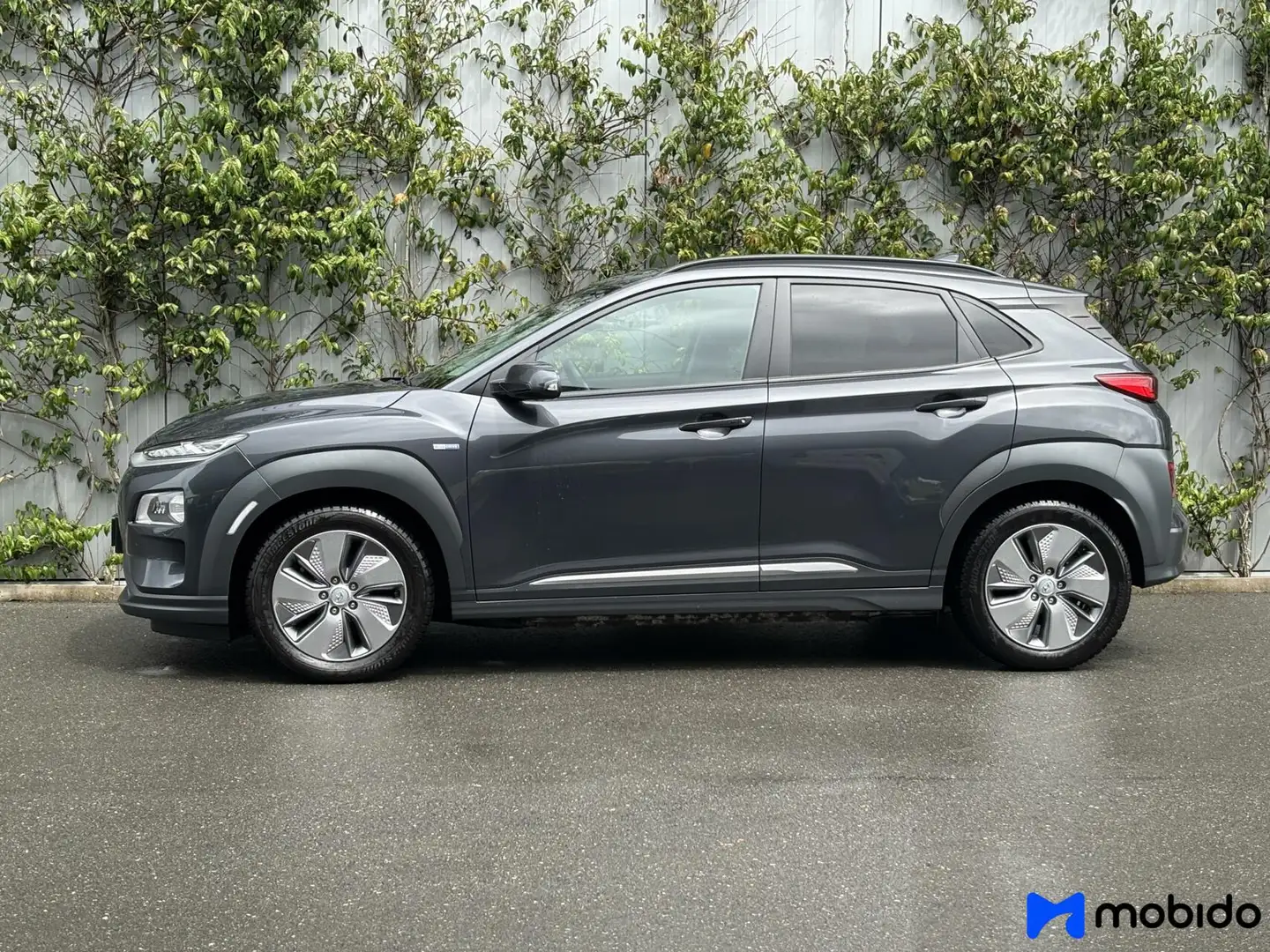 Hyundai KONA EV | Limited 64 kWh | Schuif/kanteldak | Grigio - 2