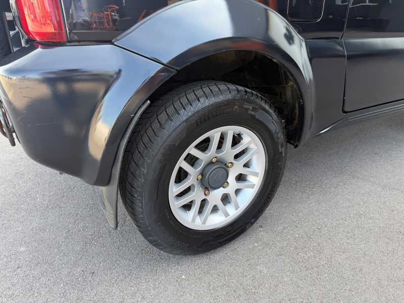 Suzuki Jimny 1.3 JX 4X4 LIER/OFFROADBANDEN/STOELVERWARMING/AIRC — photo 11