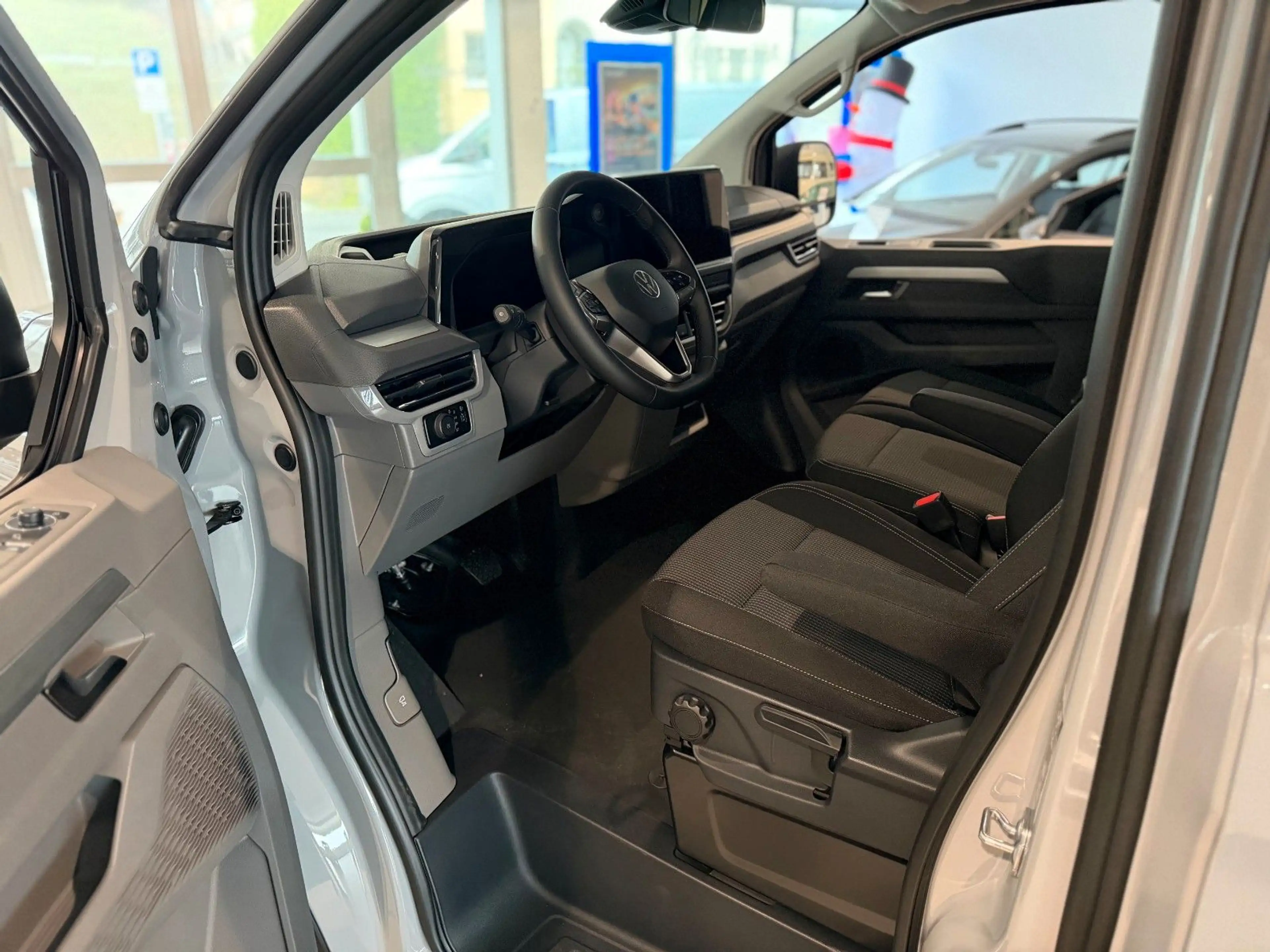Volkswagen T7 Caravelle *KR*SideAssist*ACC*FLÜGELTÜR*5JGARA — photo 10