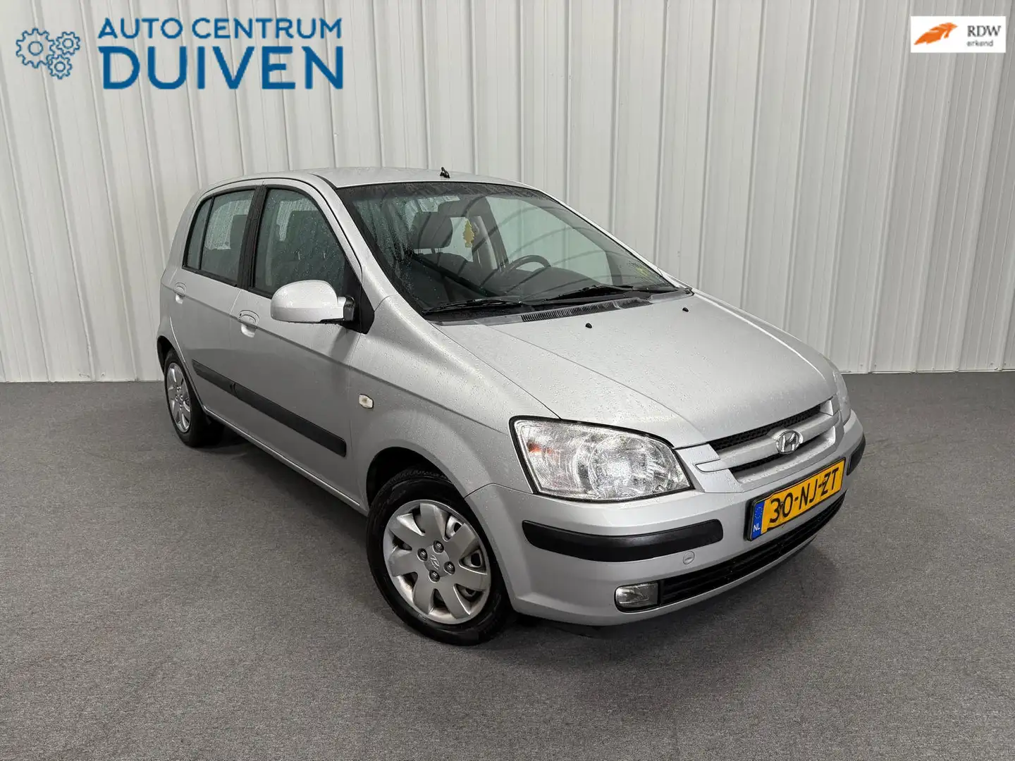 Hyundai Getz 1.3i GLS Chic | Nieuw APK | Airco | Trekhaak Gris - 1