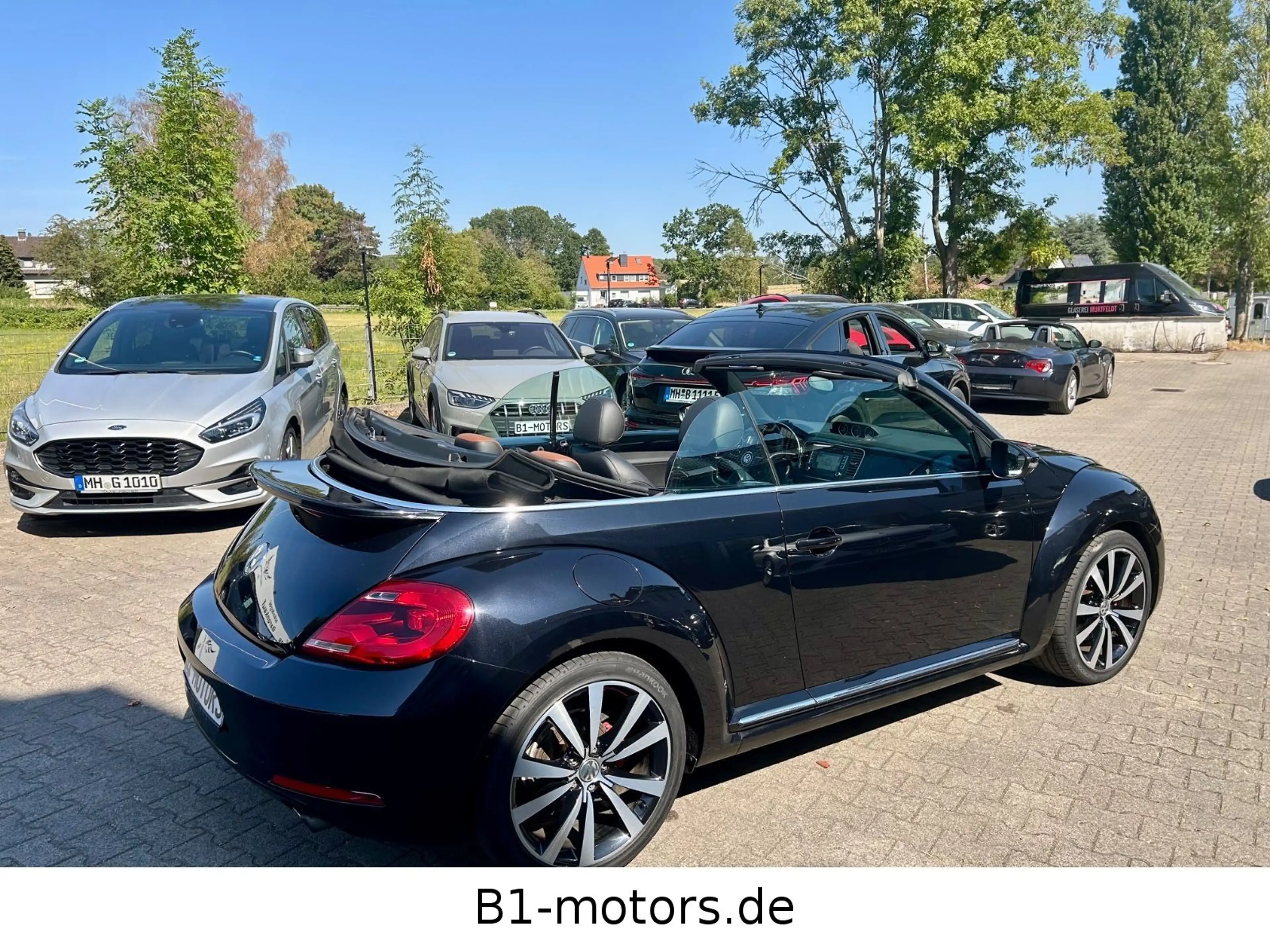 Volkswagen Beetle Cabriolet Exclusive Sport*DSG*Leder*Navi* — photo 5