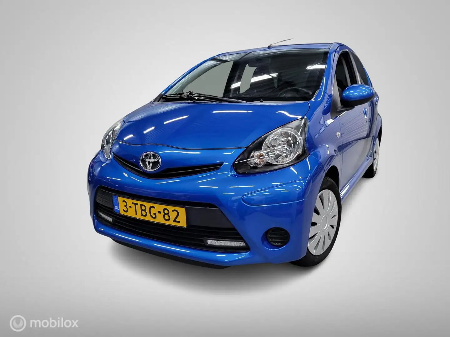 Toyota Aygo 1.0 VVT-i Aspiration/Airco/Bluetooth/Led/Nap Blau - 1
