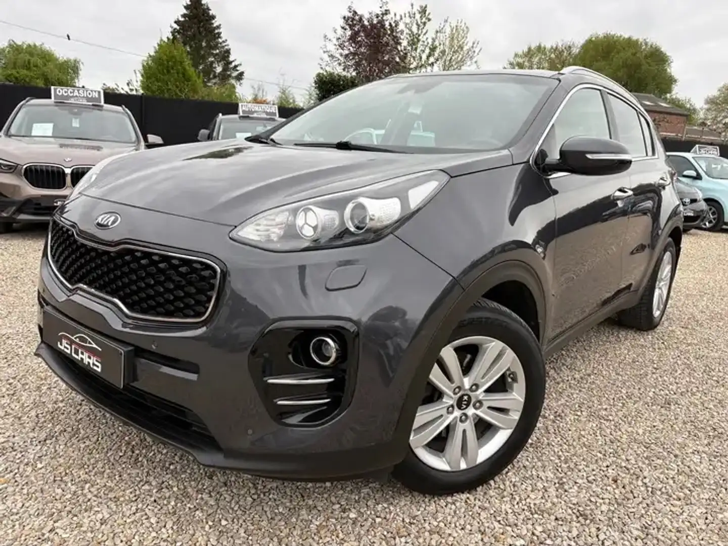 Kia Sportage 1.7 CRDi 2WD Business*NAVI*CAMERA*SEMI CUIR*AIRCO* Grijs - 1